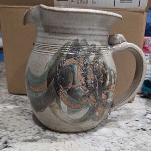Handcrafted Ceramic Pitcher with Earthy Tones
